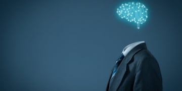 Coverbild mit einem Anzugträger, der statt eines Kopfs, ein blau leuchtendes, künstliches Gehirn trägt